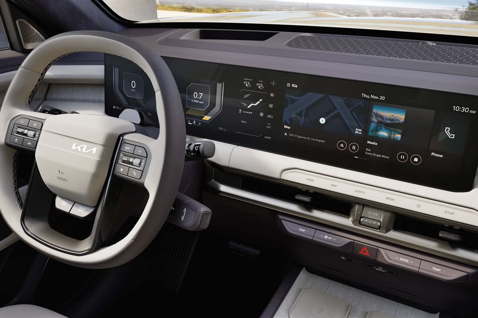 Kia dashboard with digital displays and touchscreen infotainment