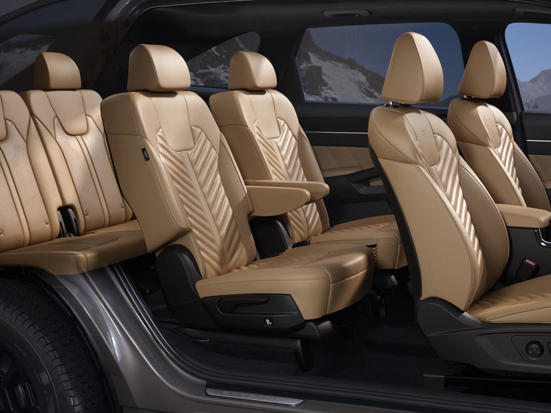 Passenger cabin of a Kia Sorento showing its flexible three-row seating arrangement.