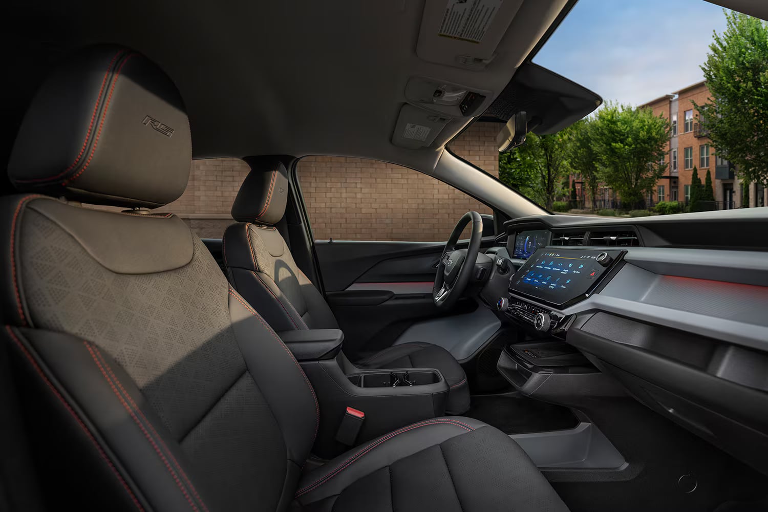 2027 Chevrolet Bolt RS interior with Black Evotex seats and Red stitching