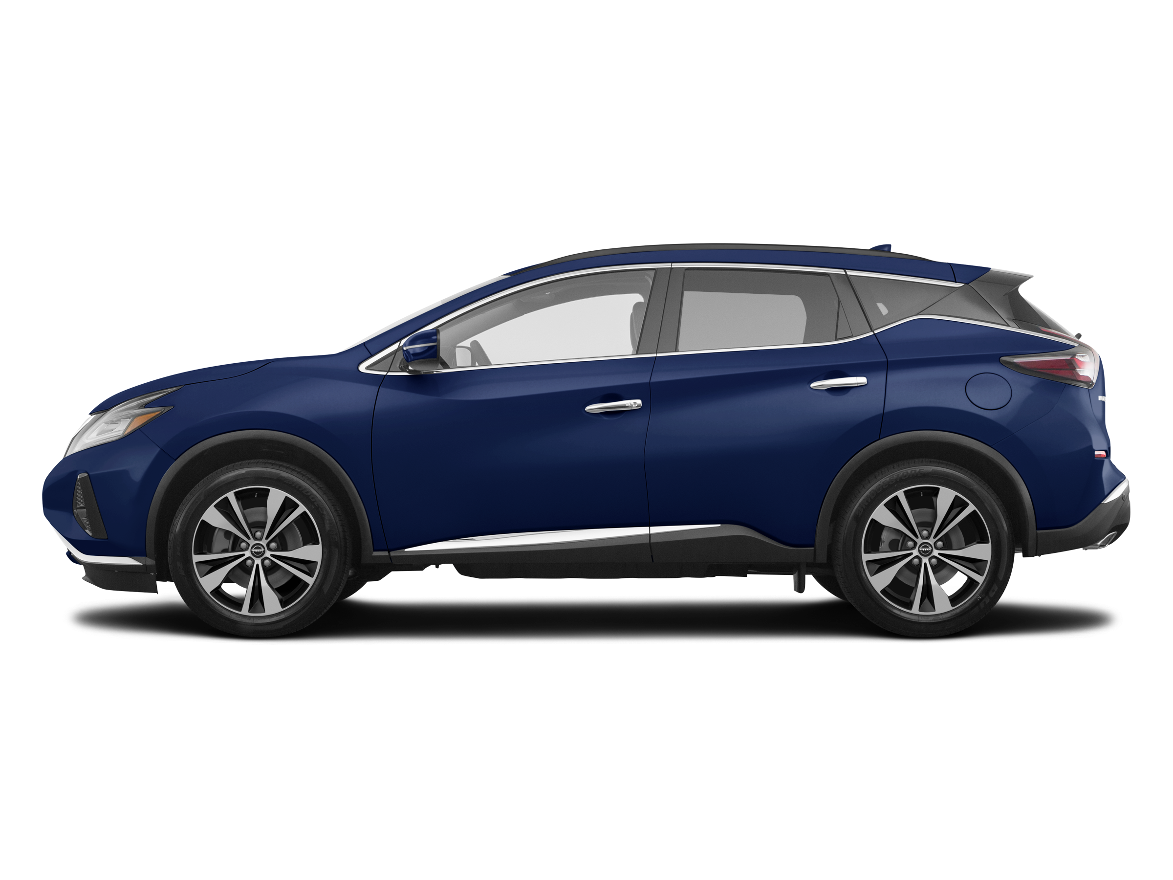 A pearl white Nissan Murano parked in a scenic Tennessee driveway.