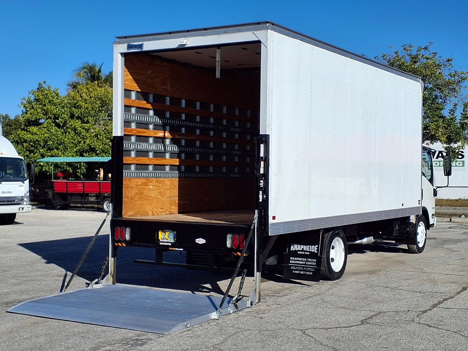 Knapheide truck with lift gate extended.