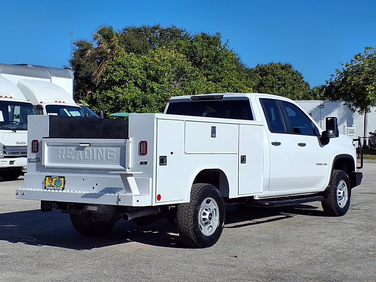 A service body truck with exterior storage compartments
