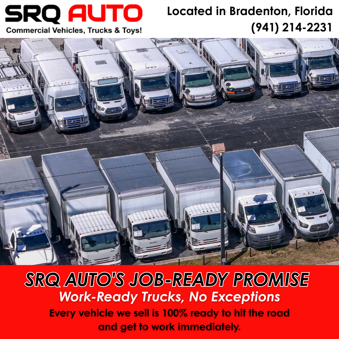 A line of professional white cargo vans parked at SRQ Auto LLC in Bradenton, Florida