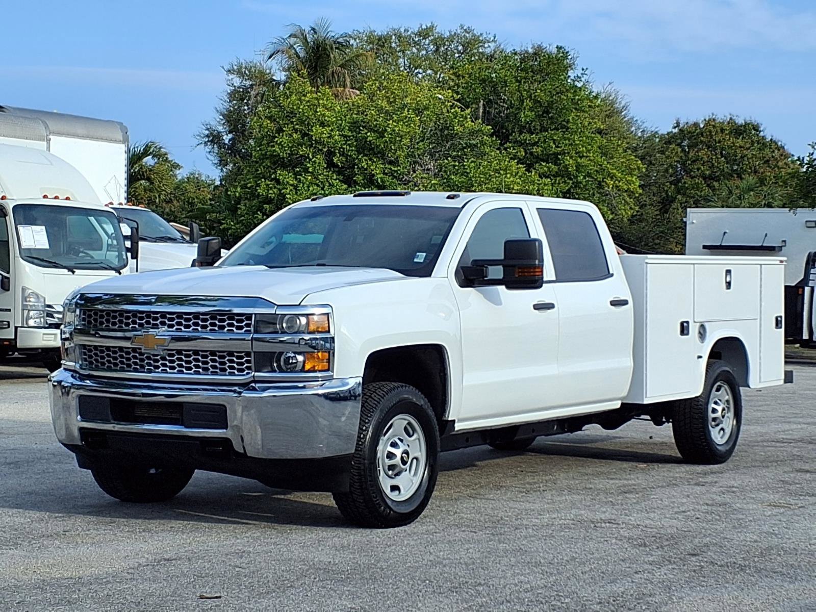 Specialized commercial vehicles like box trucks and dump trucks.