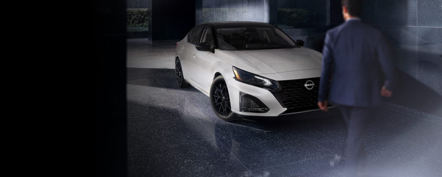 The 2026 Altima featuring the black V-motion grille and LED headlights