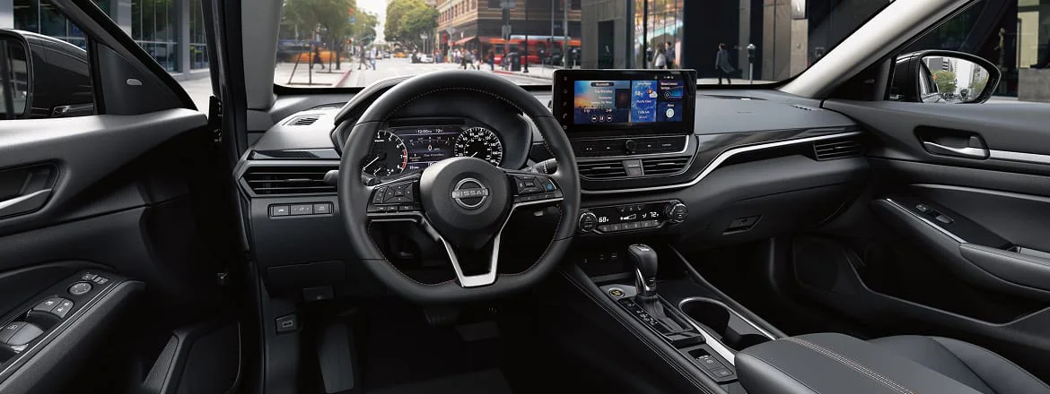 Interior view of the 2026 Altima featuring the massive 12.3-inch HD touchscreen