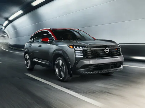 Close-up profile of the 2026 Nissan Kicks highlighting its best-in-class 8.4-inch ground clearance and new wheel design.