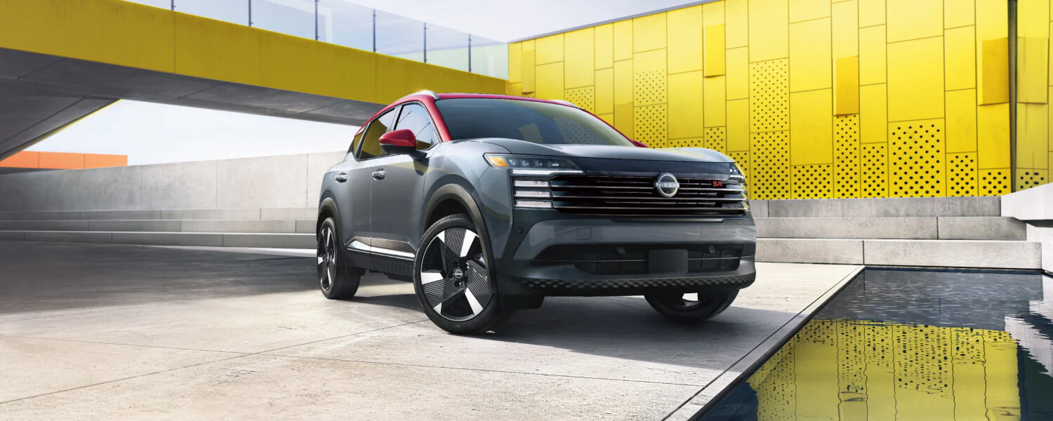 A montage of the Kicks design elements, focusing on the textured rocker panels and full-width LED taillights.