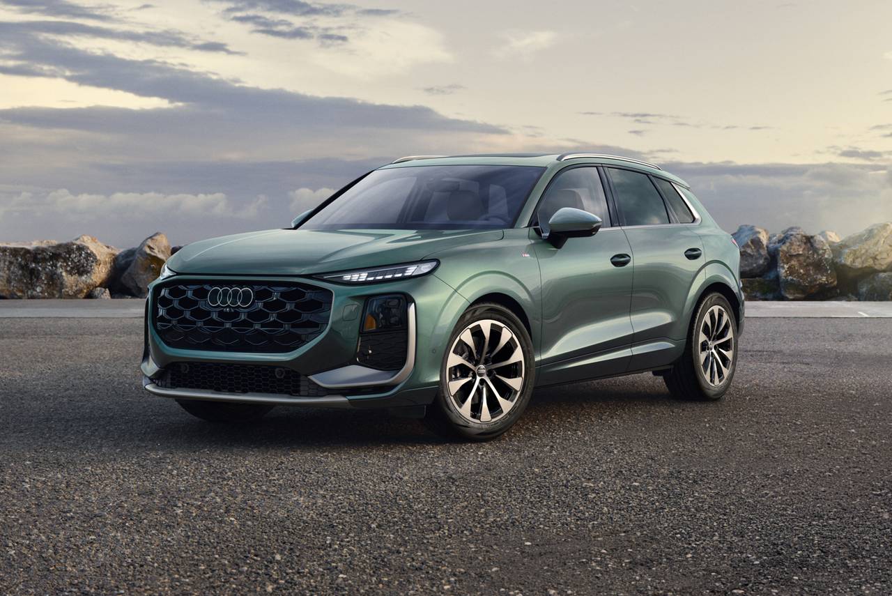 2026 Audi Q3 premium compact SUV parked on a coastal road.