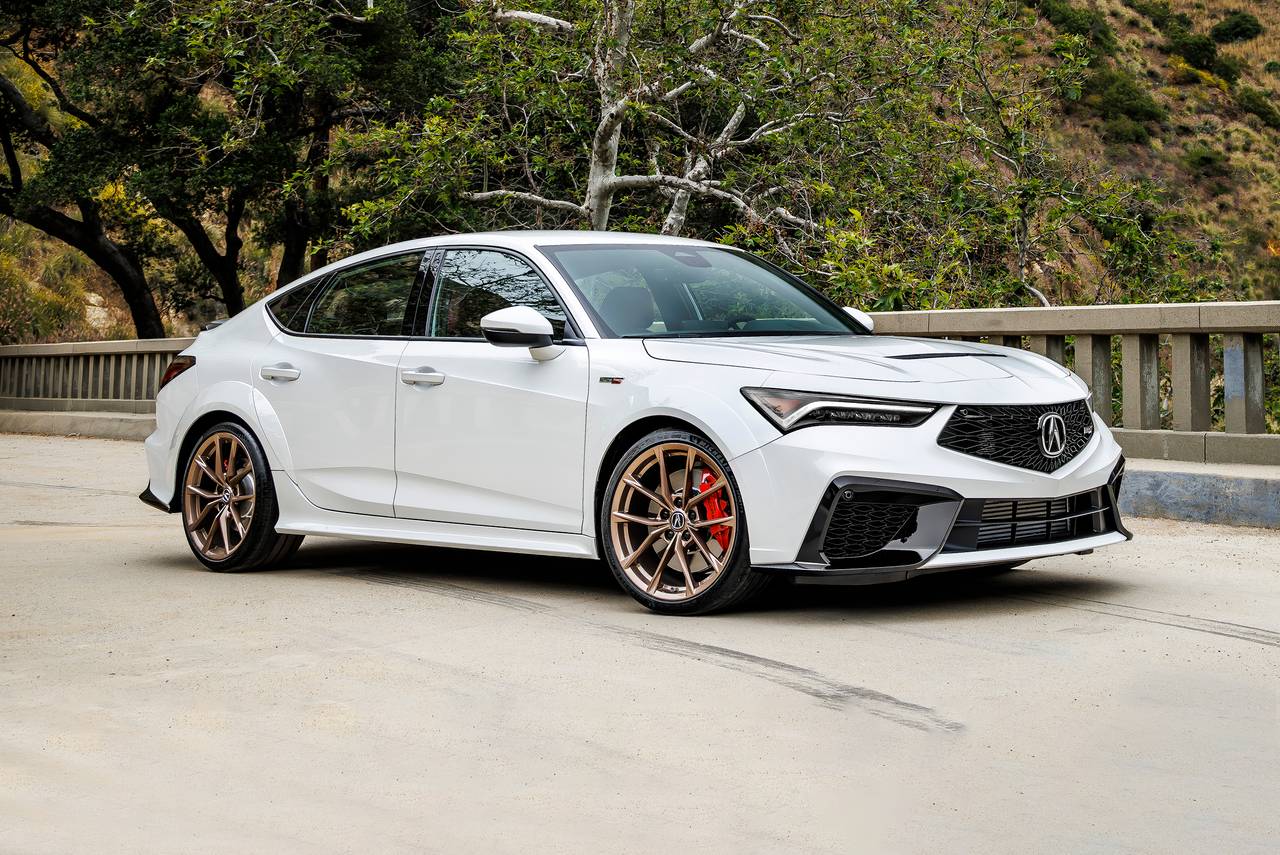 2026 Acura Integra
and Cadillac CT4 comparison