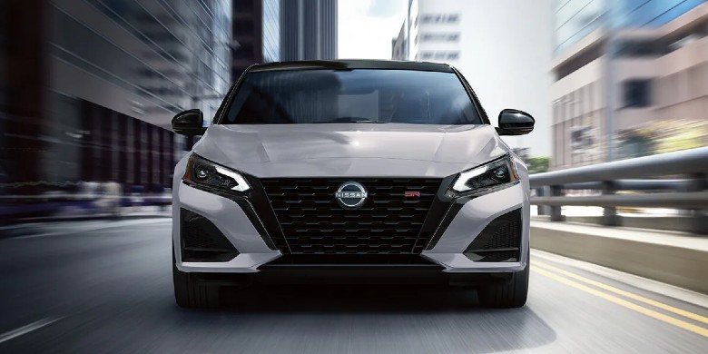 Silver 2026 Nissan Altima SR driving on an urban road