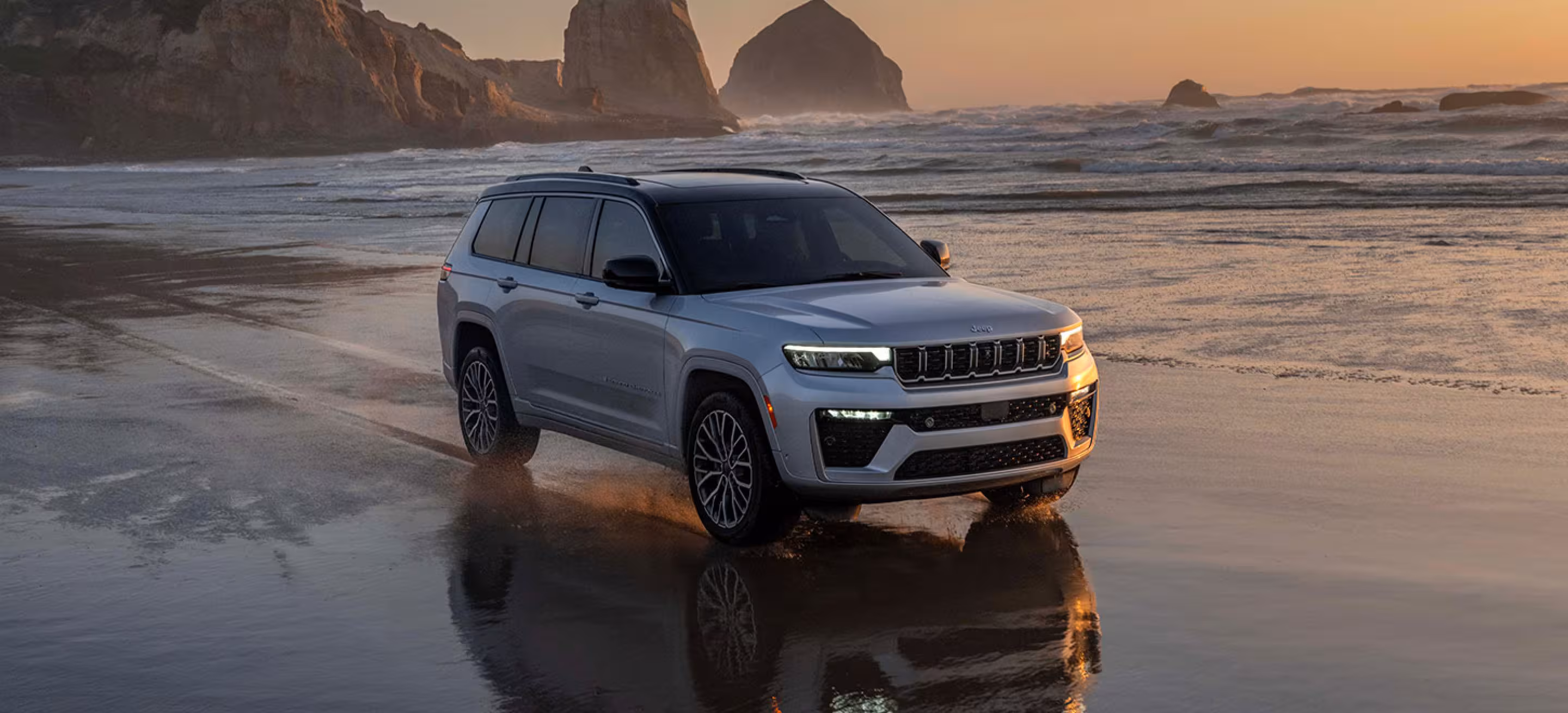 2026 Jeep Grand Cherokee interior dashboard featuring 12.3-inch touchscreen and premium Palermo leather seating