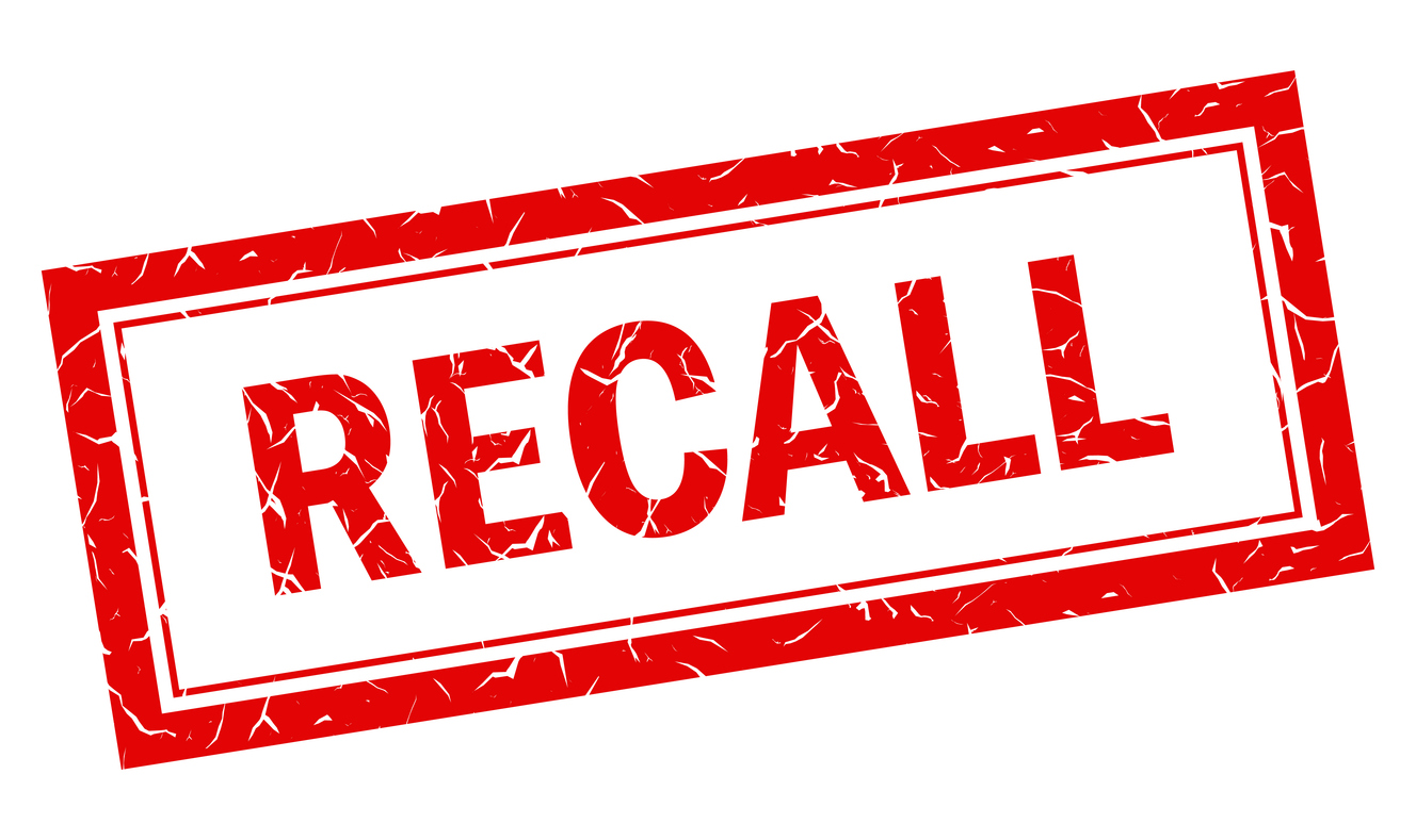 Red distressed rubber stamp with the word RECALL in bold capital letters, tilted on a white background.