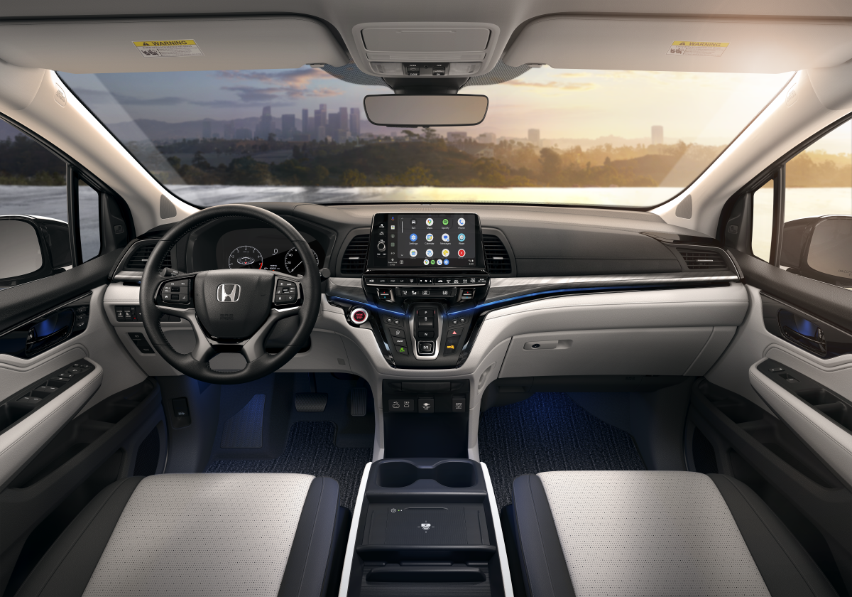 Honda Odyssey interior showcasing dashboard and infotainment system.