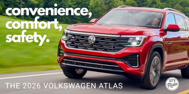 2026 Volkswagen Atlas on a road with green background.