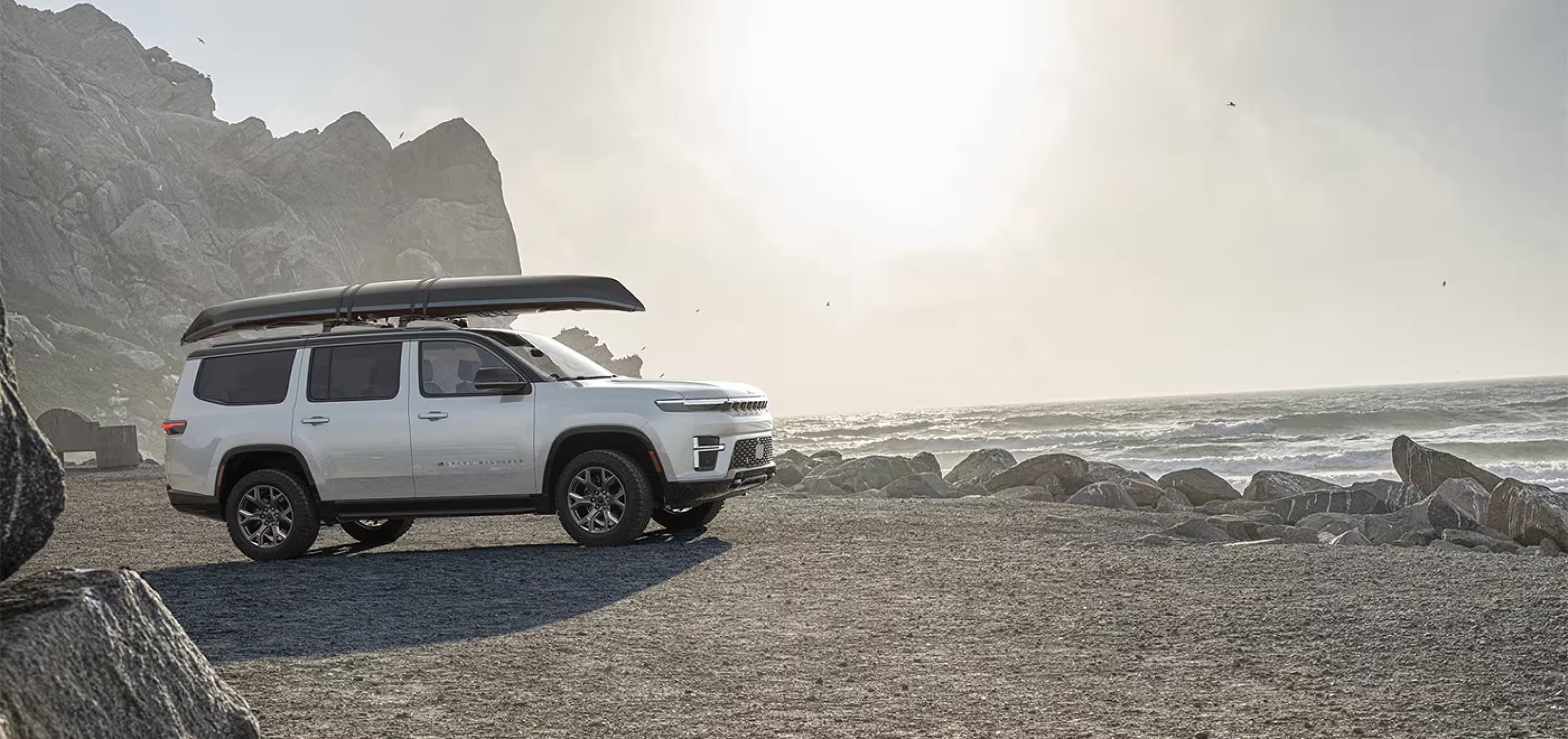 2026 Jeep Grand Wagoneer driving near water