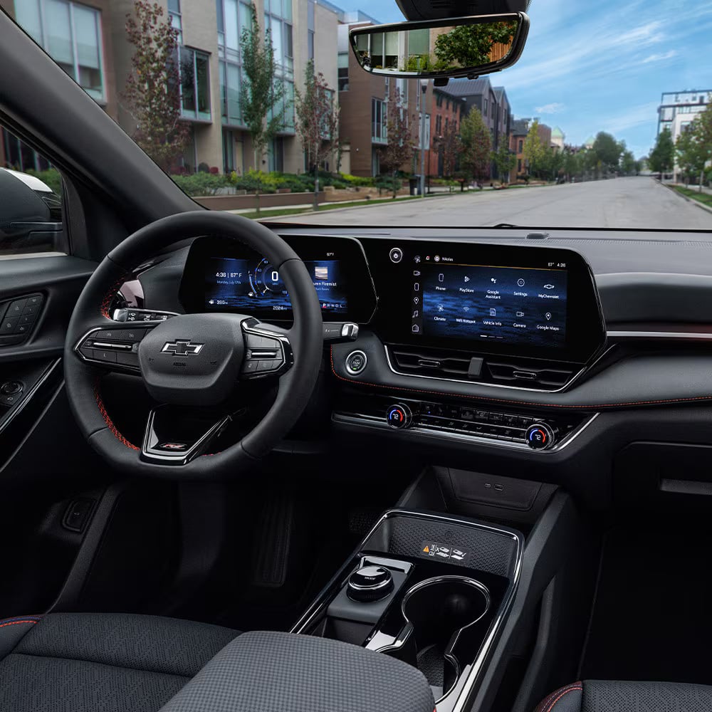 Chevrolet Equinox dashboard with digital screens and flat-bottom steering wheel.