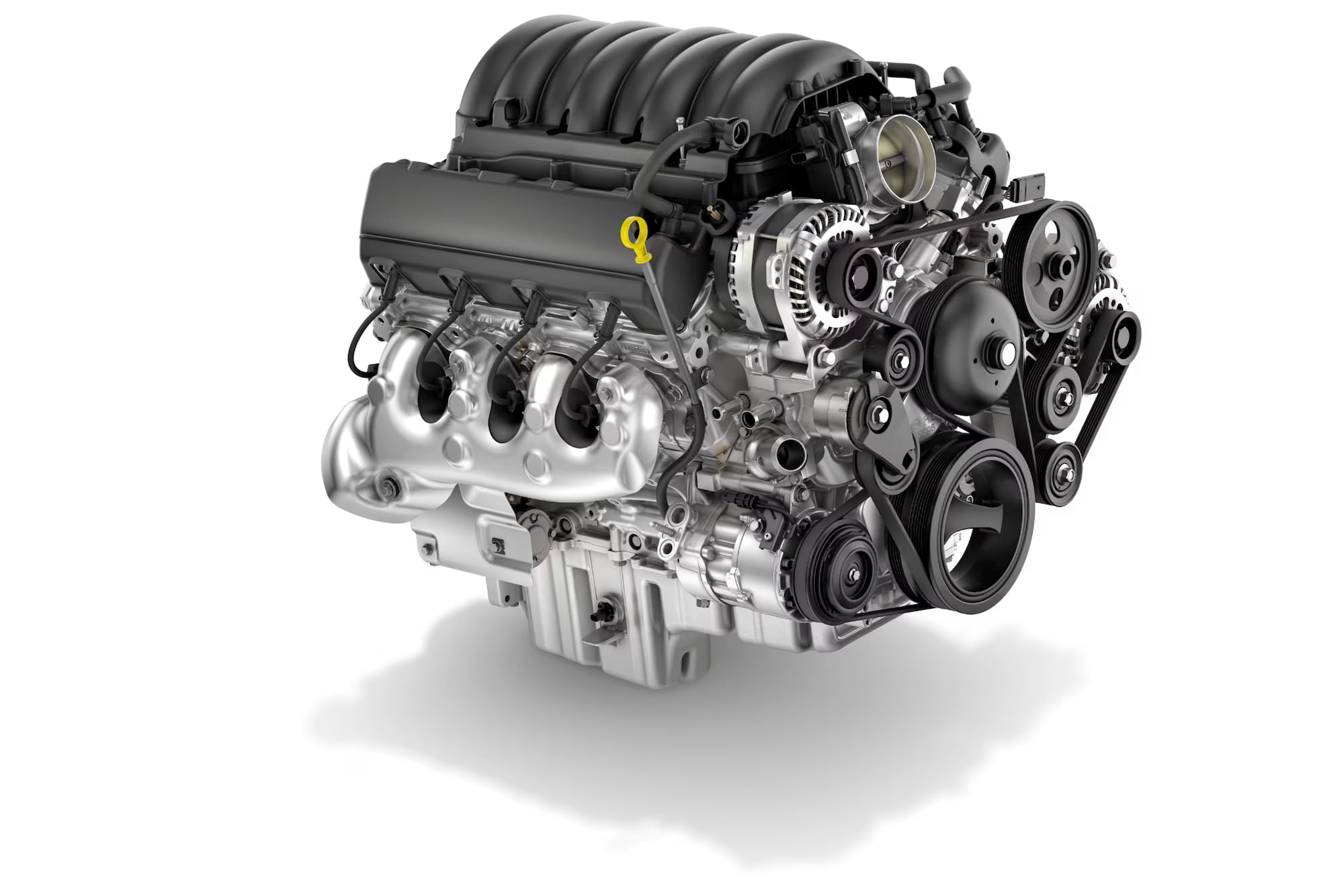 Duramax V8 car engine with silver exhaust headers and black intake manifold on a white background.