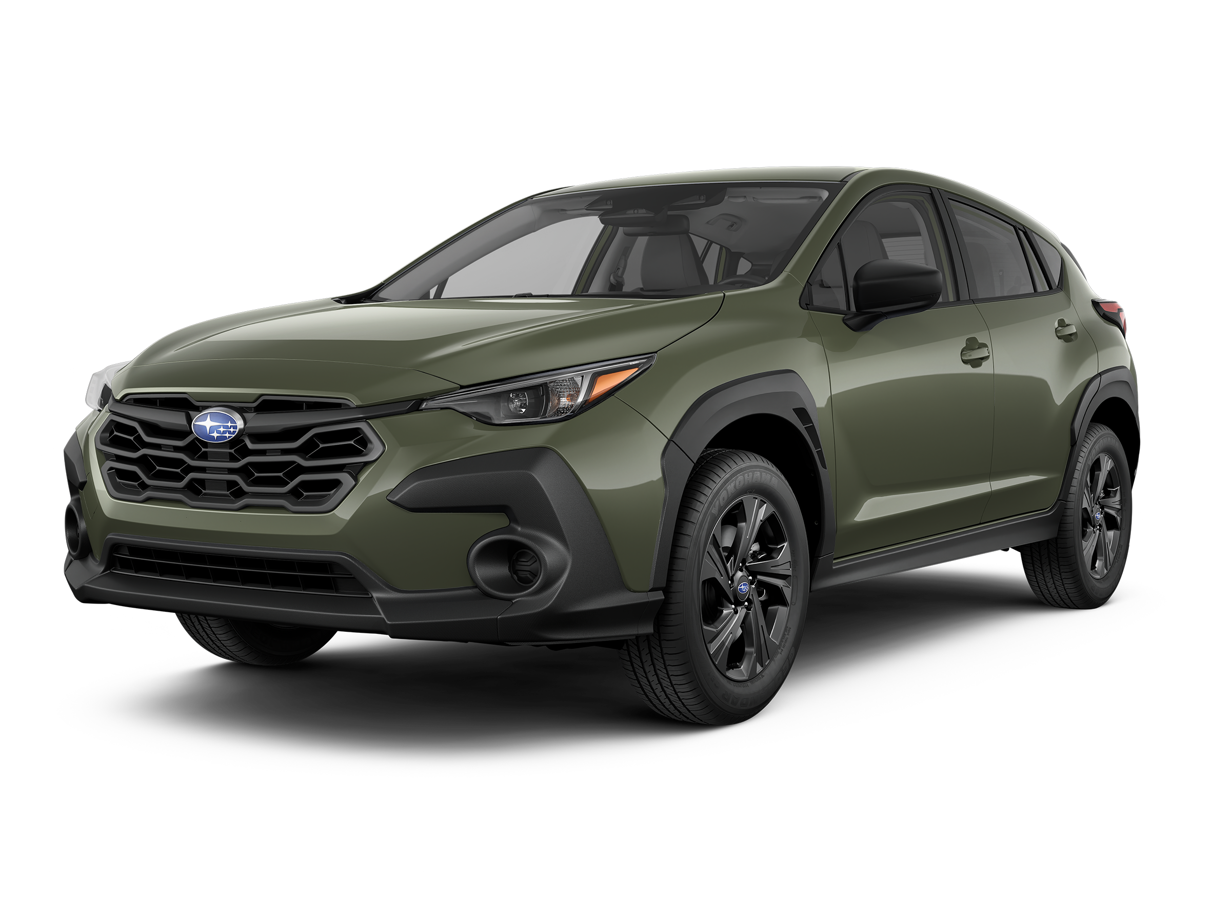 Green Subaru Crosstrek Wilderness SUV on black background.