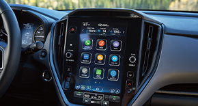 Subaru Outback infotainment system display showing app icons.
