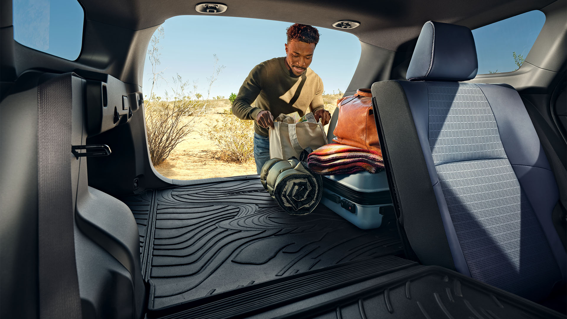 A Subaru equipped with a roof rack, mountain bikes, and all-weather protective gear