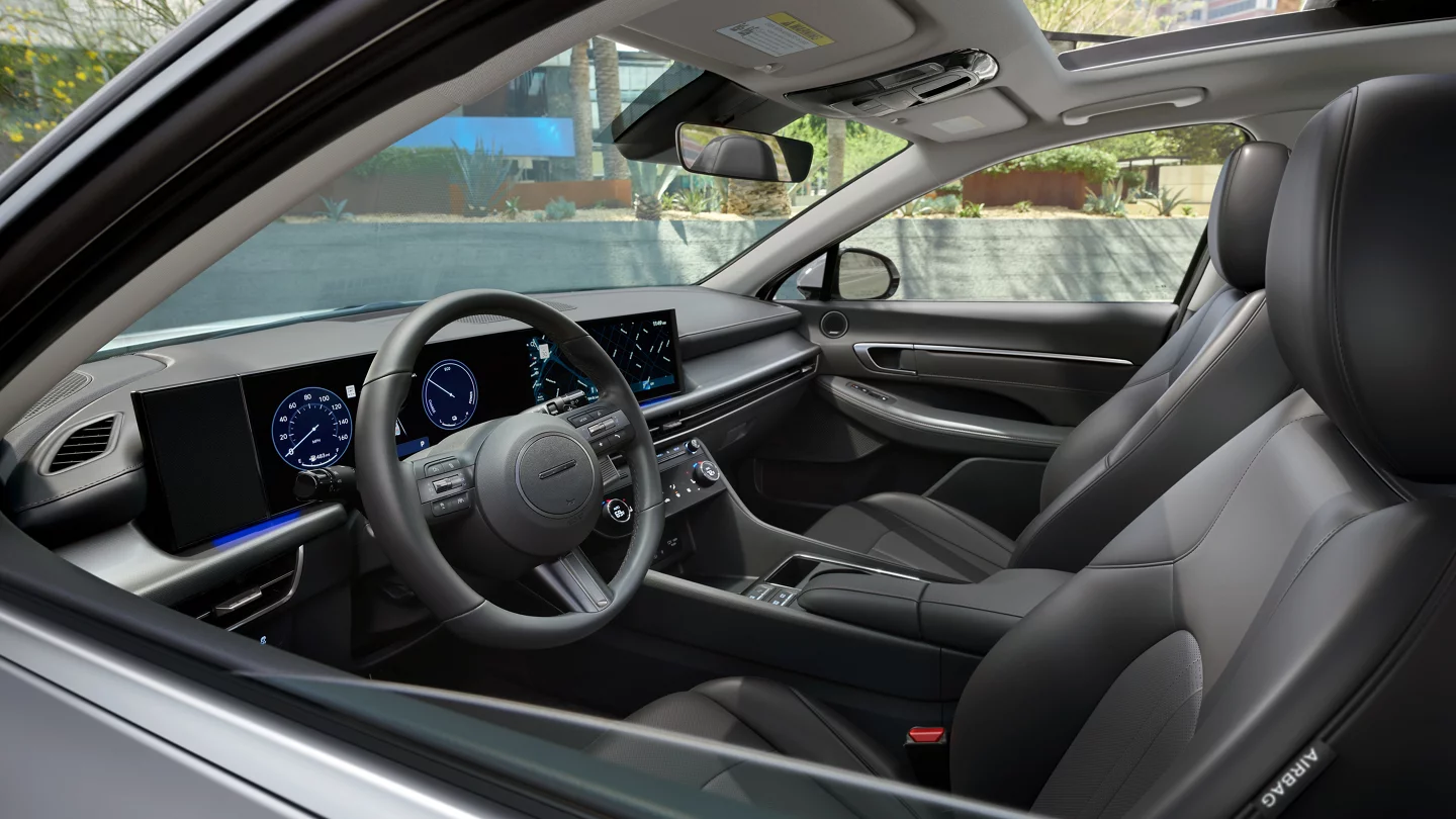 Modern Hyundai Sonata interior featuring a digital cockpit and sleek dashboard.