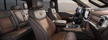 Wide angle view of the 2026 F-150 interior showing the generous legroom and premium seating