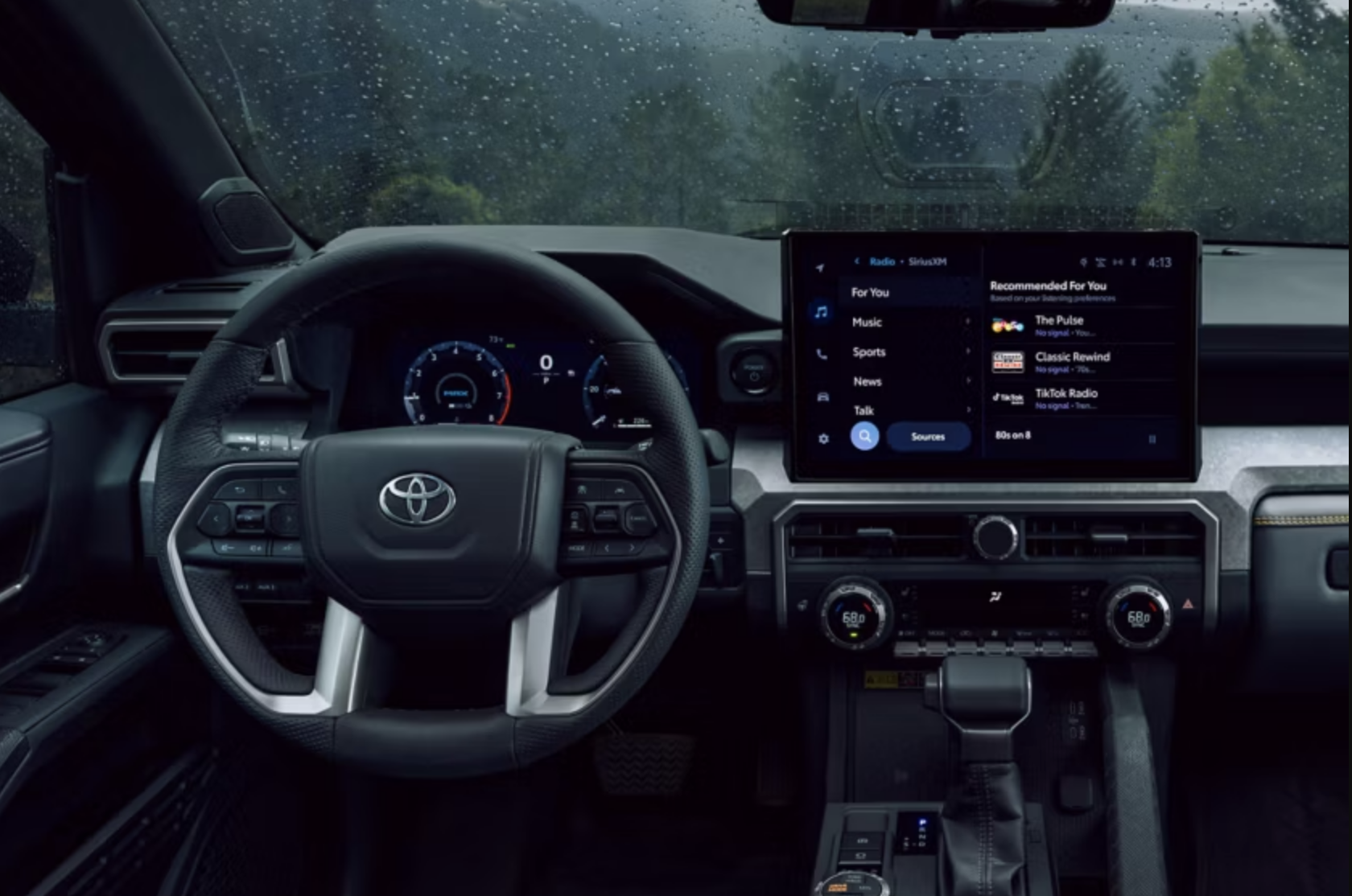Dashboard interior of a modern Toyota SUV with a large touchscreen