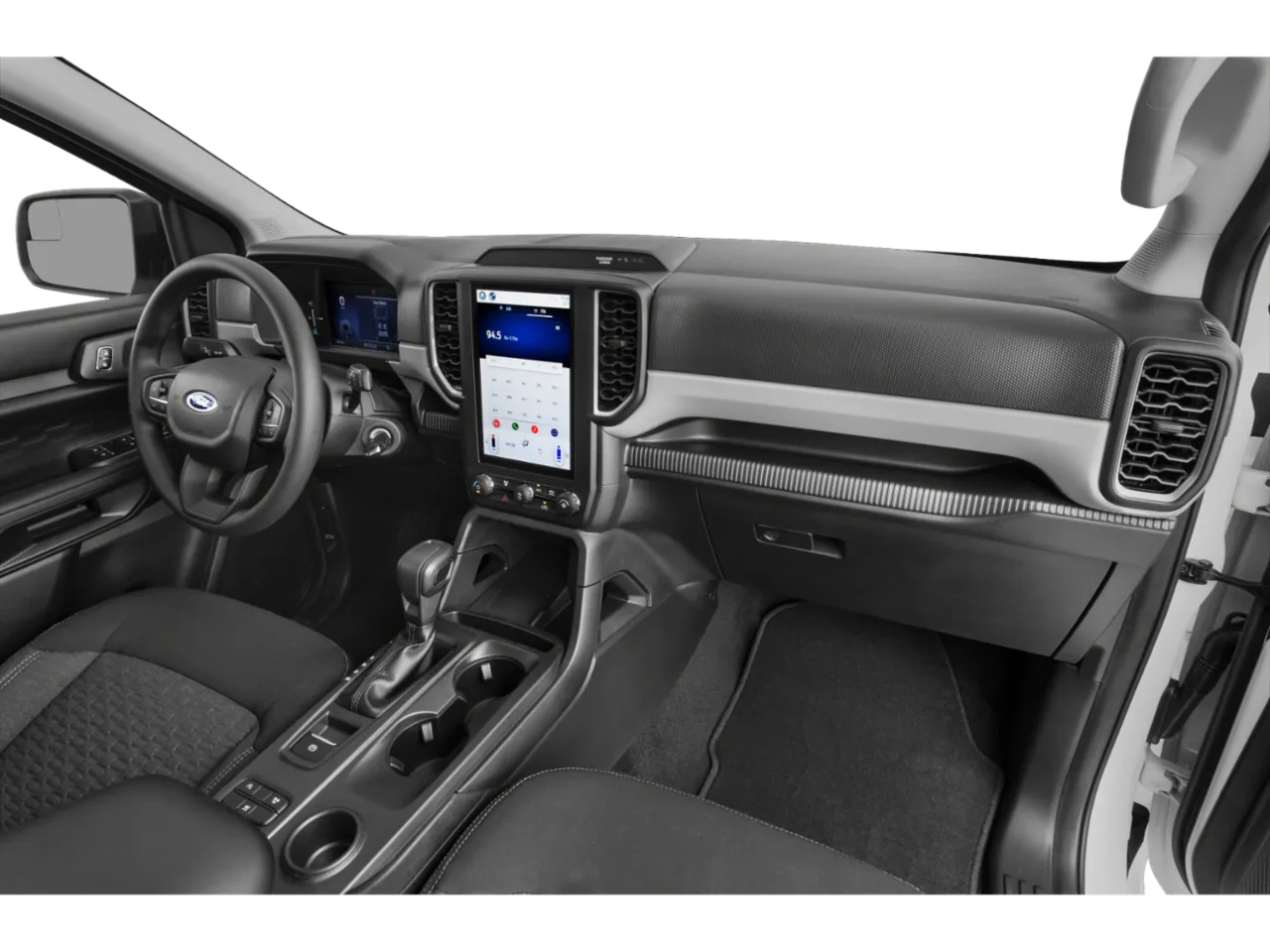 Interior dashboard and console of a Ford truck with large infotainment display.